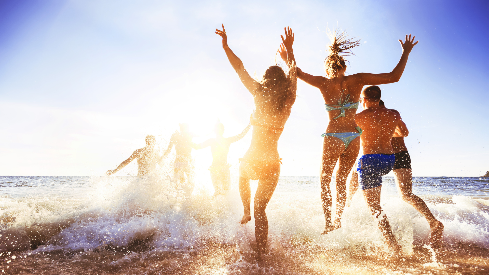 Group Of Friends Having Fun At The Beach
