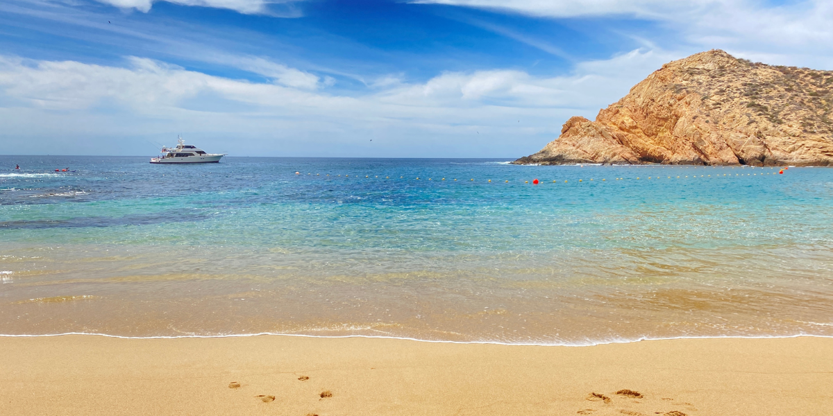 Beaches for Safe Swimming in Cabo Luxury yacht anchored in a calm Cabo San Lucas Bay