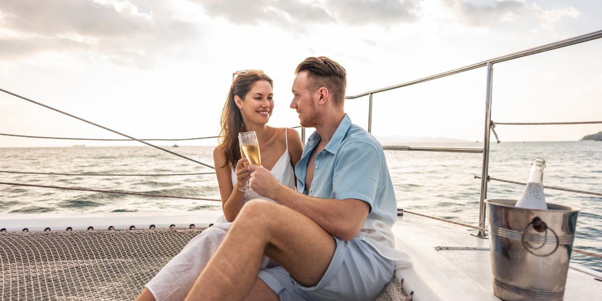 A couple in love on a romantic date on a yacht